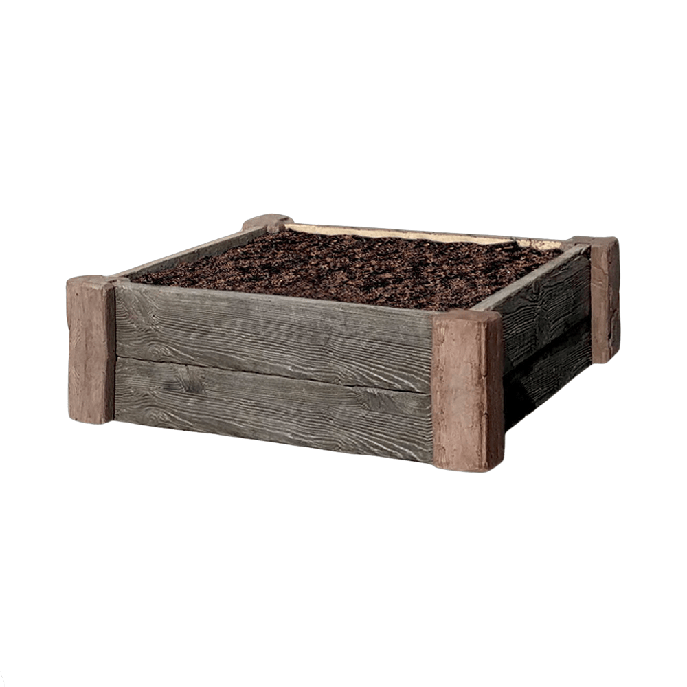 a wooden box with dirt in it